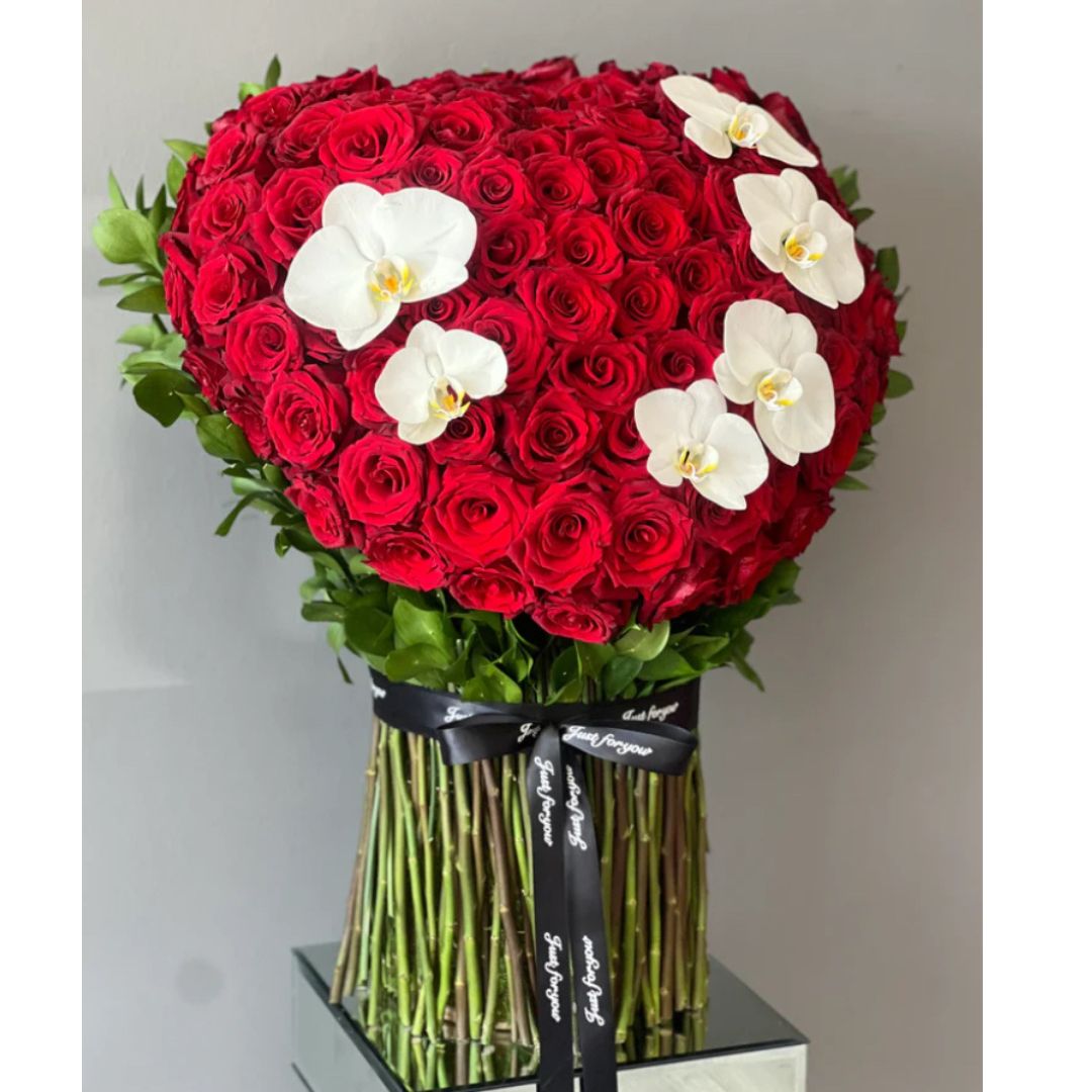 Romantic Red roses and white orchids arrangement